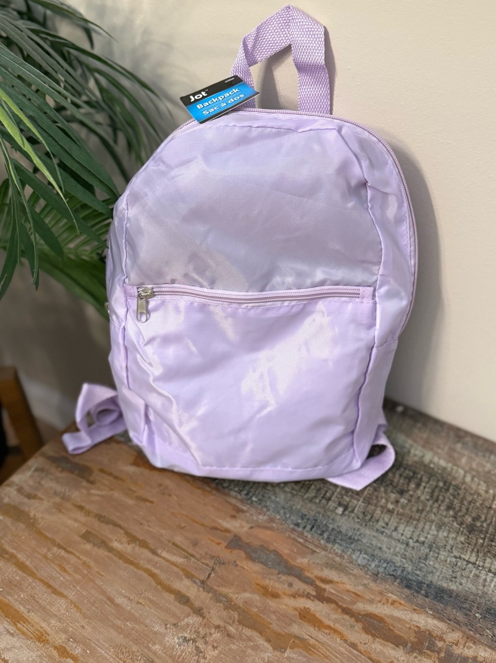 New Light purple  small nylon backpack. Adjustable straps. New with tag